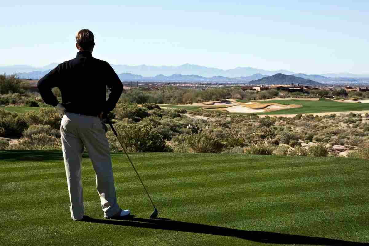 golfer waiting on players ahead of him