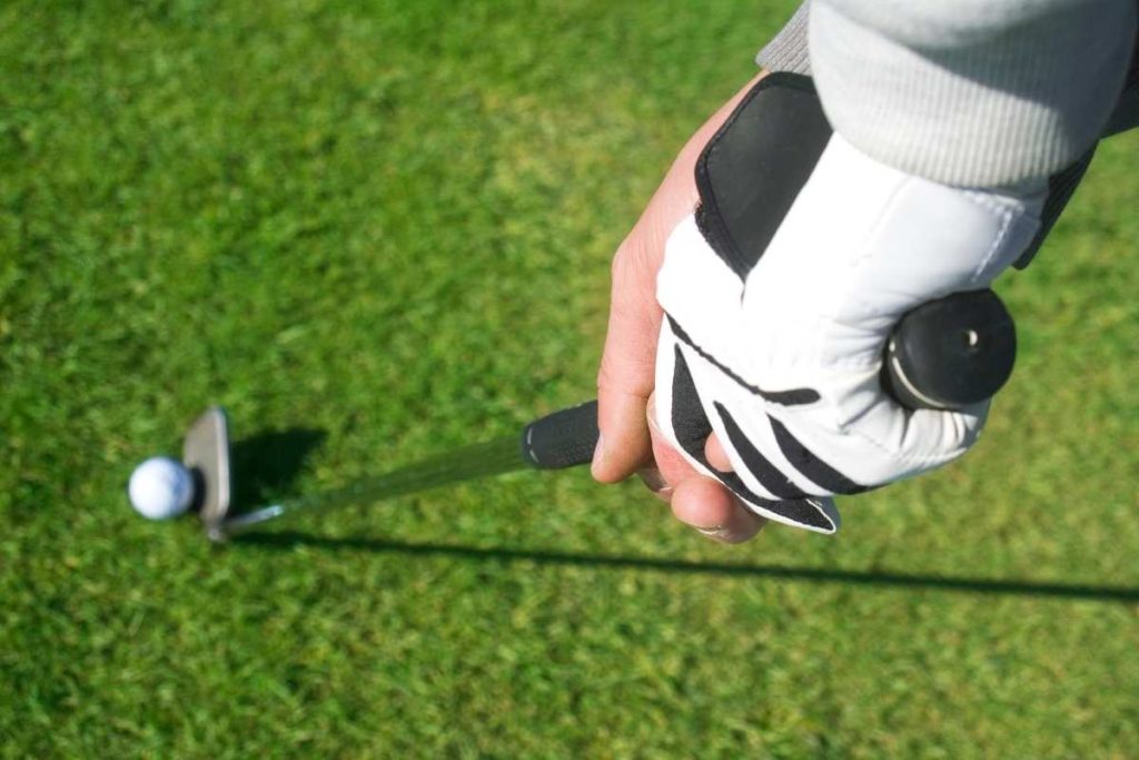 golfer wearing a golf glove