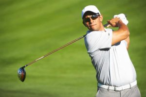 golfer wearing sunglasses