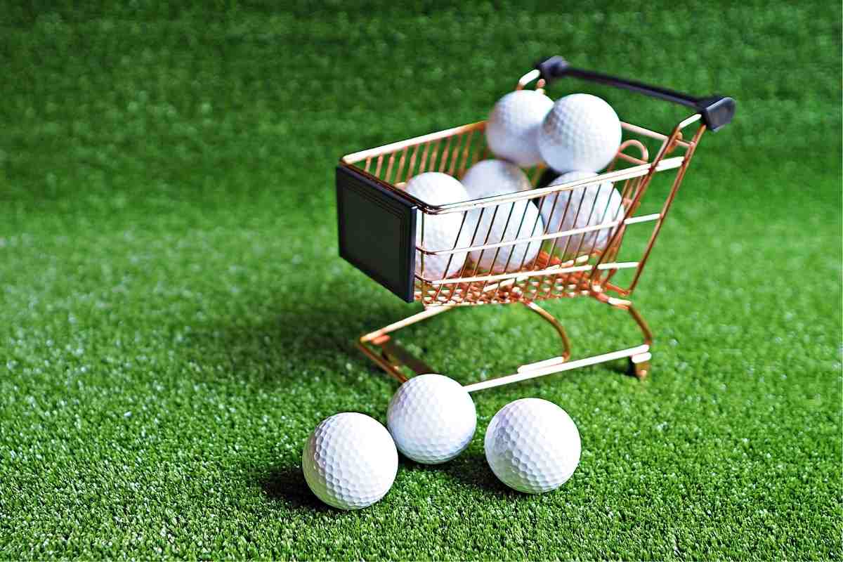 golf balls in a mini shopping cart