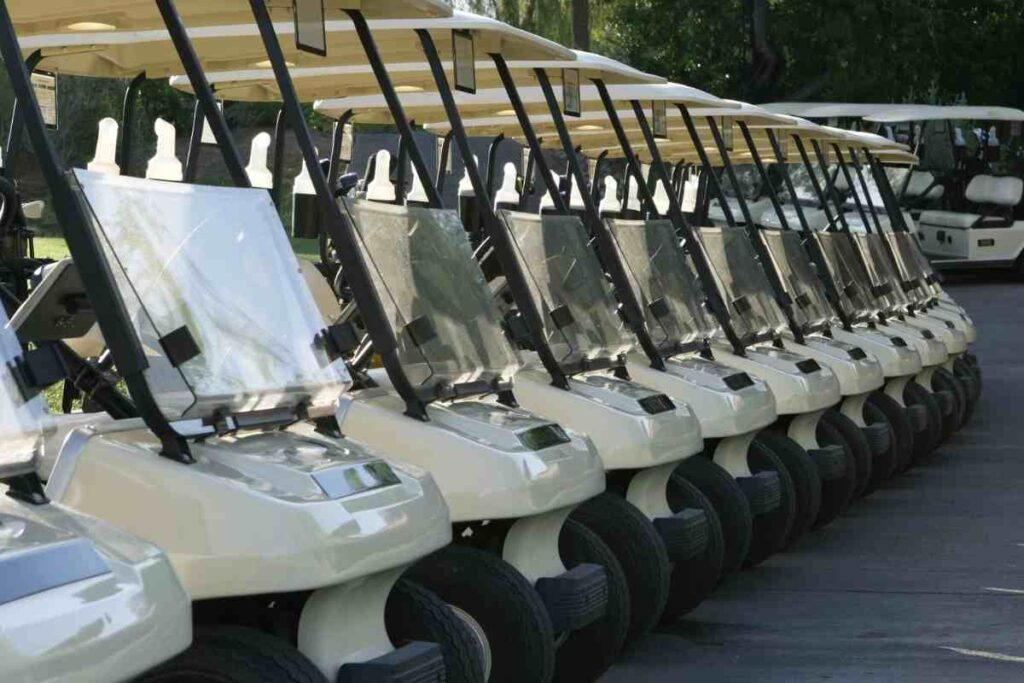 golf carts lined up for shotgun start