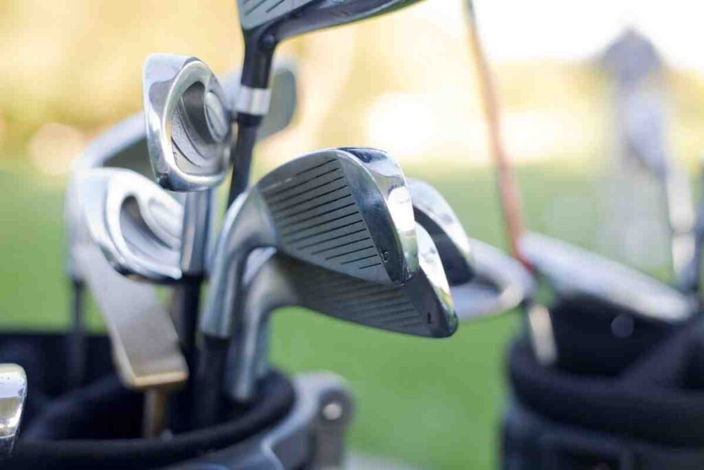 random golf clubs in a golf bag