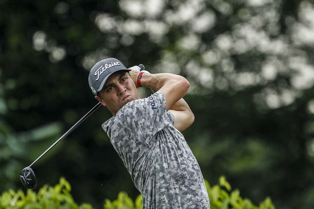 justin thomas with titleist driver