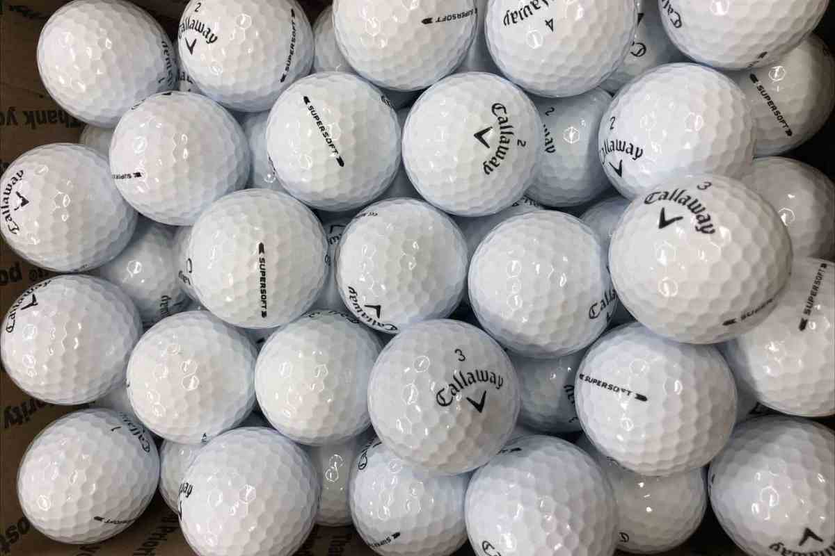 lots of callaway supersoft golf balls laid out